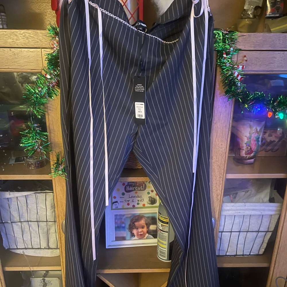 Fashion Nova grey and White Striped women Pants. Pink lace up features.
